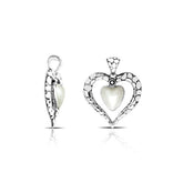 Sterling silver heart pendant with luminous Pearl – handcrafted Bali jewelry symbolizing love, purity, and elegance